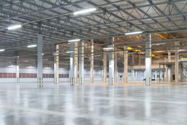 Warehouse interior with new commercial LED lighting and polished concrete floor