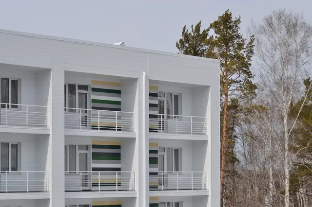 Multi-family buildings with new siding and trim