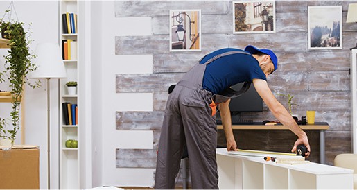 contractor measuring interior decorations
