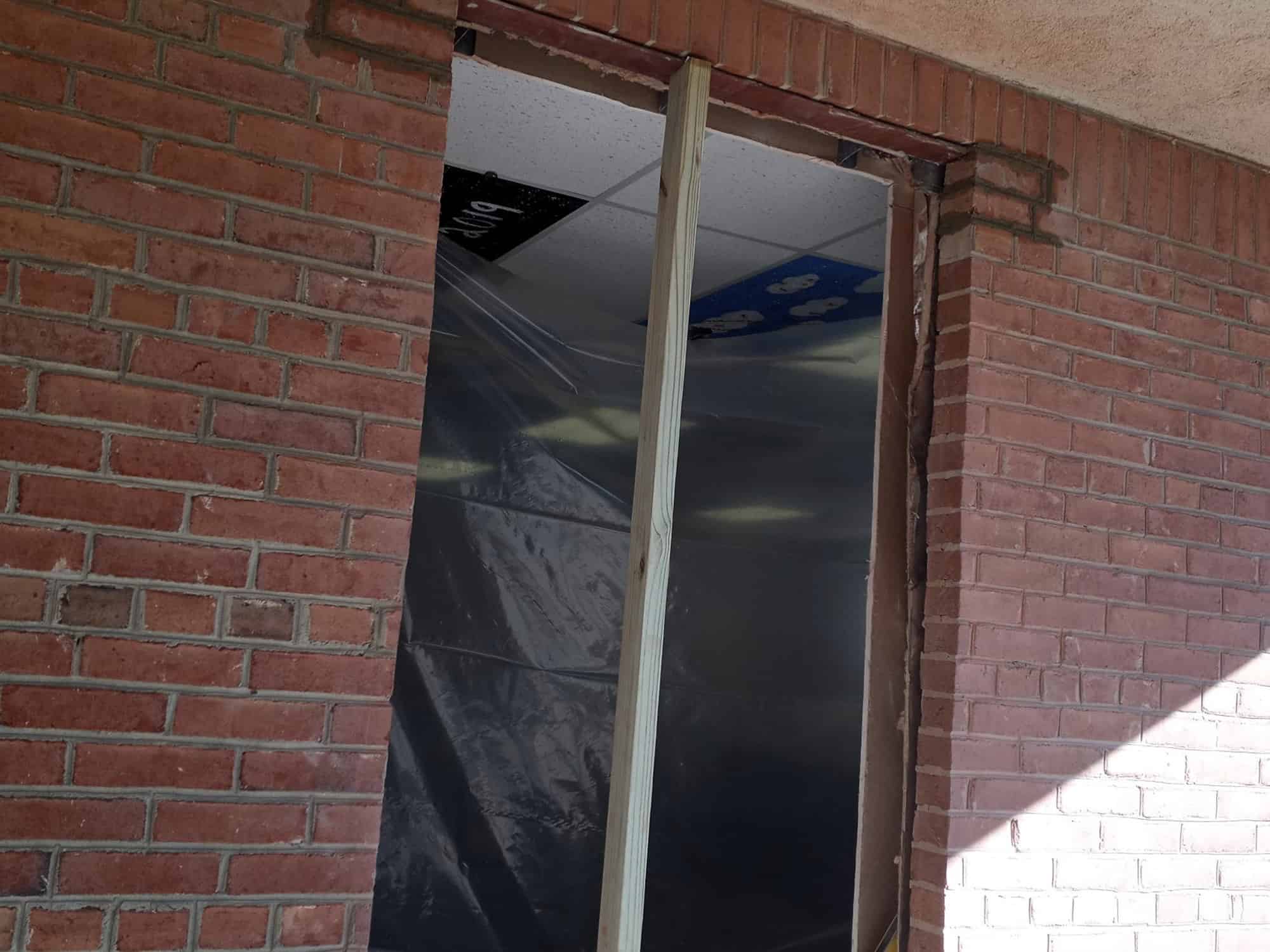 wooden beam in open door frame