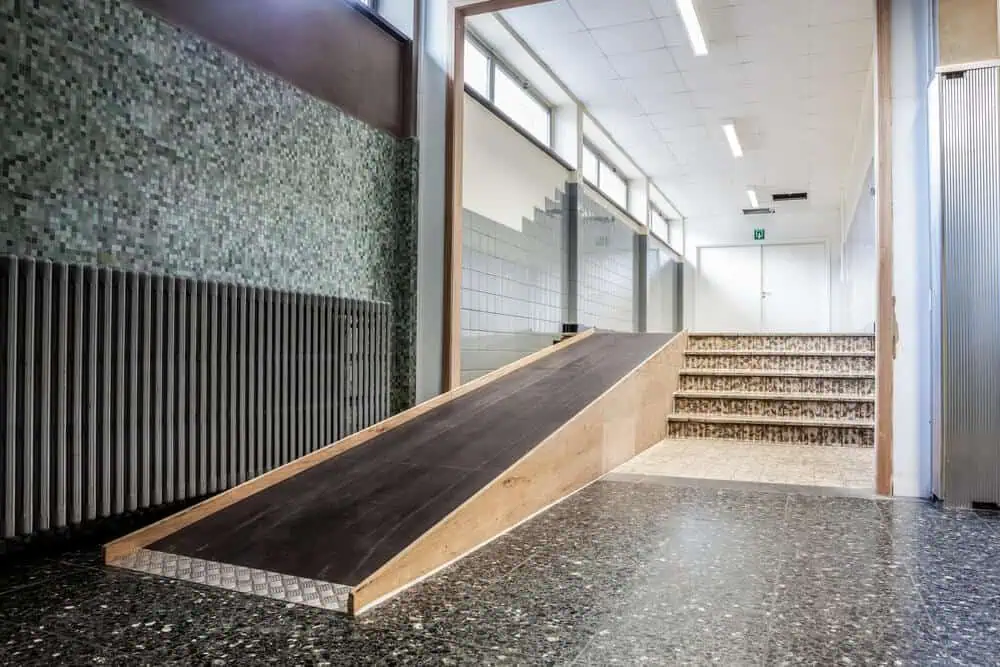 ramp next to stairs improve ADA compliance