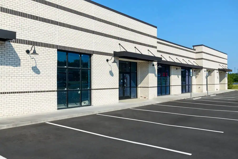 A commercial building with a brick exterior.