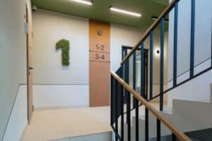 Commercial stairwell with clean, smooth drywall surfaces