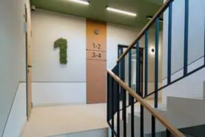 Commercial stairwell with clean, smooth drywall surfaces