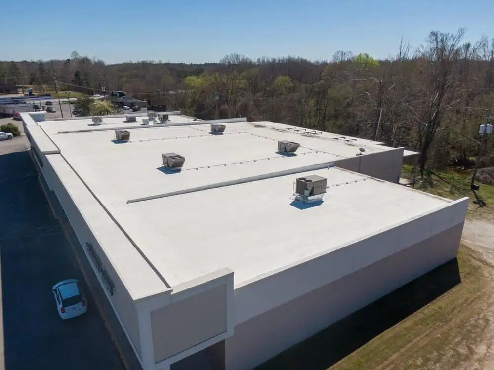 A small shopping center with a TPO roofing membrane